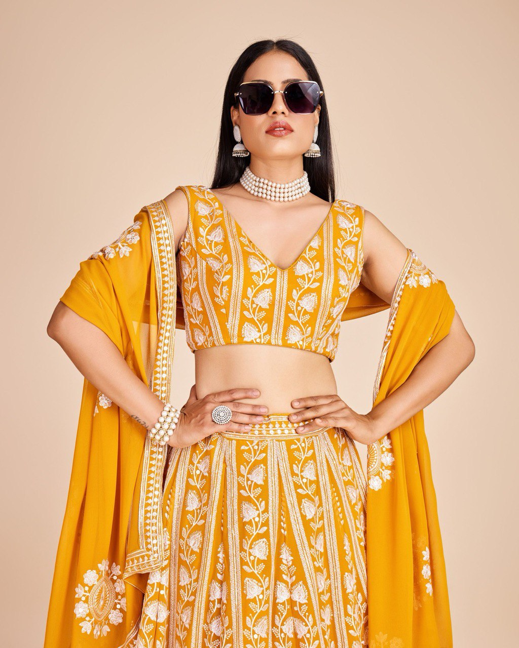 Yellow Faux Georgette Embroidered Sequins Lehenga With Choli And Dupatta Party Wear