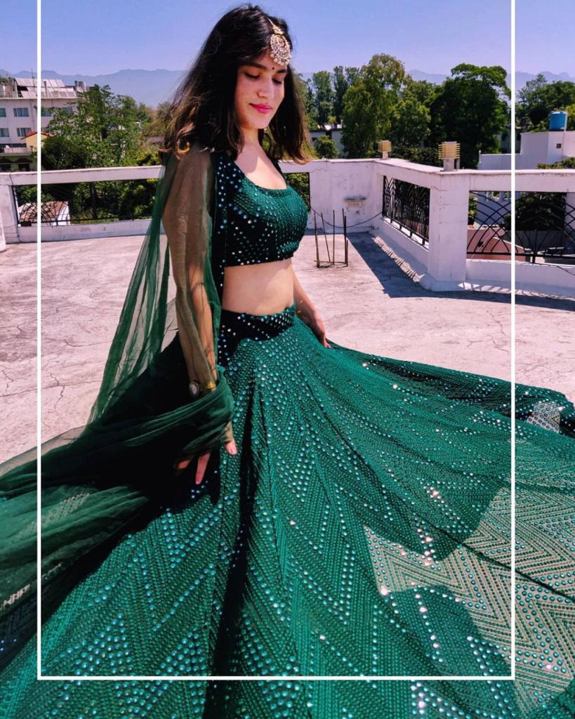 EXCLUSIVE-BRILLIANT-WORK-NET-GREEN-LEHENGA